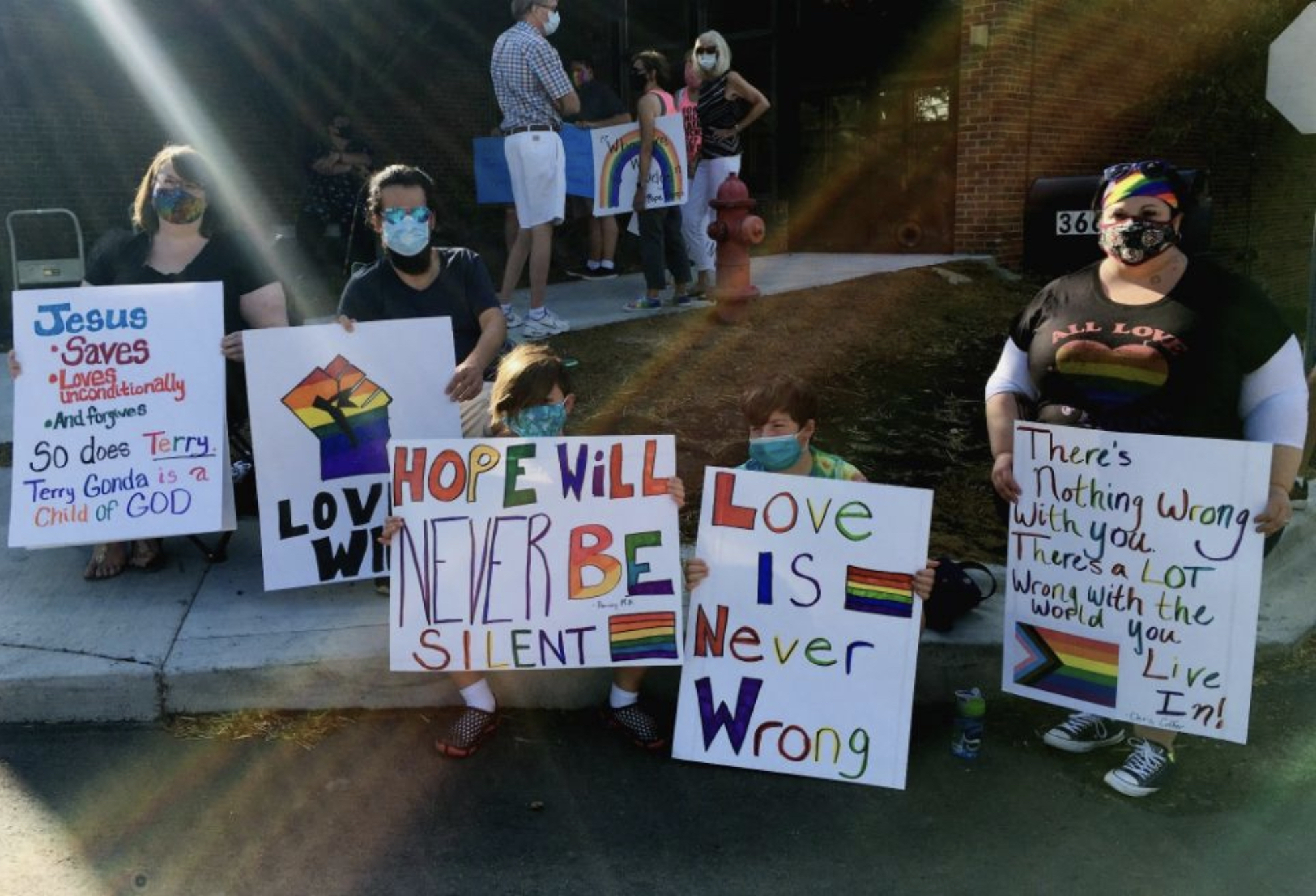 Protesters rally for Terry Gonda, a married lesbian who was fired from her role as music director at St. John Fisher Chapel University Parish in Auburn Hills, Michigan. (Between the Lines/Ellen Shanna Knoppow)