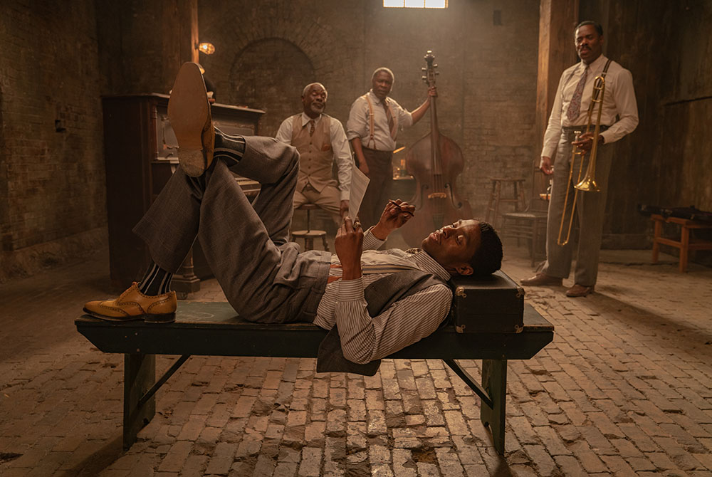 From left: Chadwick Boseman as Levee, Glynn Turman as Toledo, Michael Potts as Slow Drag, Colman Domingo as Cutler, in a still from "Ma Rainey's Black Bottom" (David Lee/Netflix)