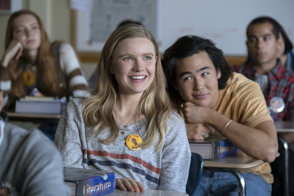 Teen girl and boy in classroom