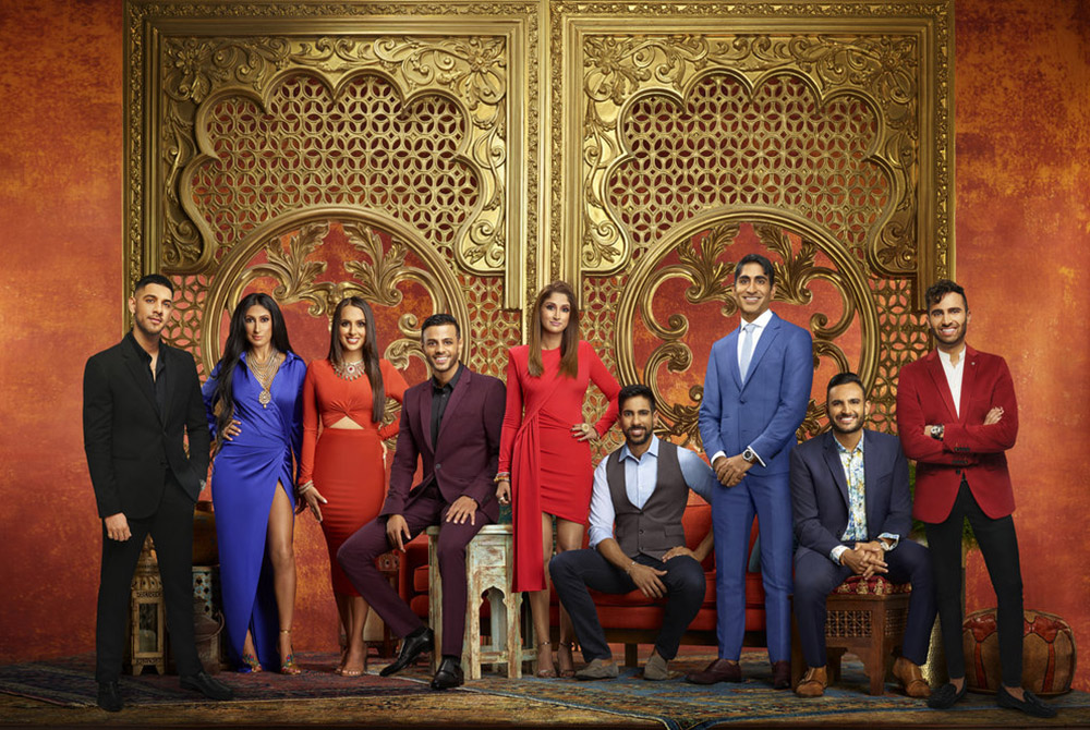 The cast of "Family Karma" includes (left to right) Rishi Karamchandani, Bali Chainani, Monica Vaswani, Brian Benni, Anisha Ram, Amrit Kapai, Vishal Parvani, Shaan Patel, Dillon Patel. (Courtesy of Bravo/Juan Manuel Garcia/Tommy Garcia)