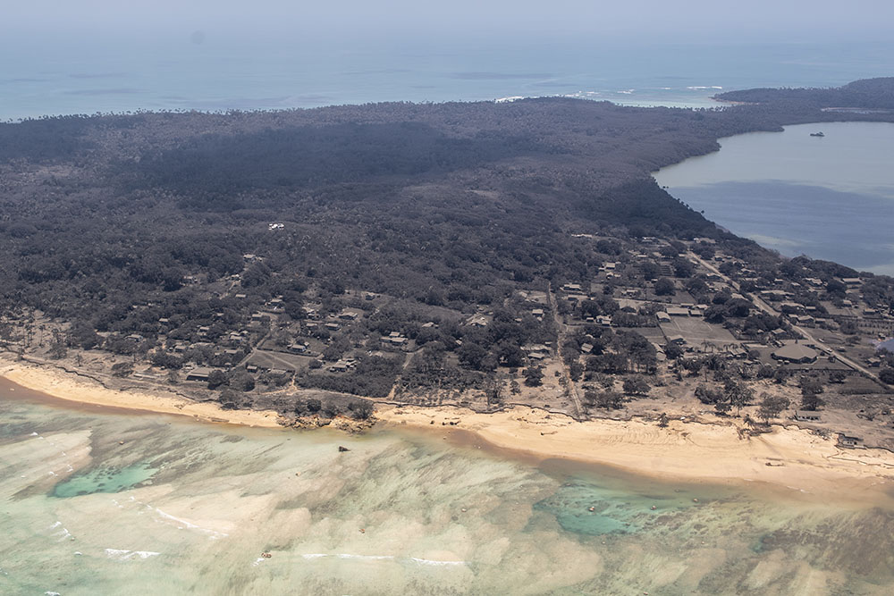 Heavy ash fall from a Jan. 15 volcanic eruption is seen in an aerial photo of Tonga Jan. 17. (Wikimedia Commons/New Zealand Defence Force)