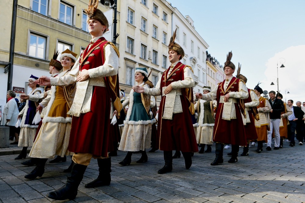 People in Warsaw, Poland, celebrate Sept. 29, ahead of the Nov. 11 centenary of Polish independence. (CNS/EPA/Marcin Obara)