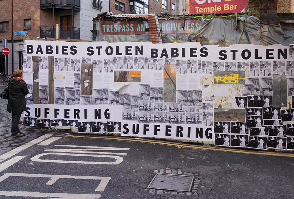 Street art in Dublin in 2013 protests Ireland's system of adopting the babies of unmarried mothers from mother and baby homes, which were often run by Catholic nuns. (Flickr/William Murphy)