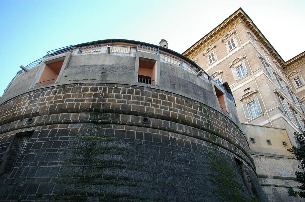 The headquarters of the Institute for the Works of Religion, commonly known as the Vatican bank, with the Apostolic Palace in background (NCR photo/Joshua J. McElwee)