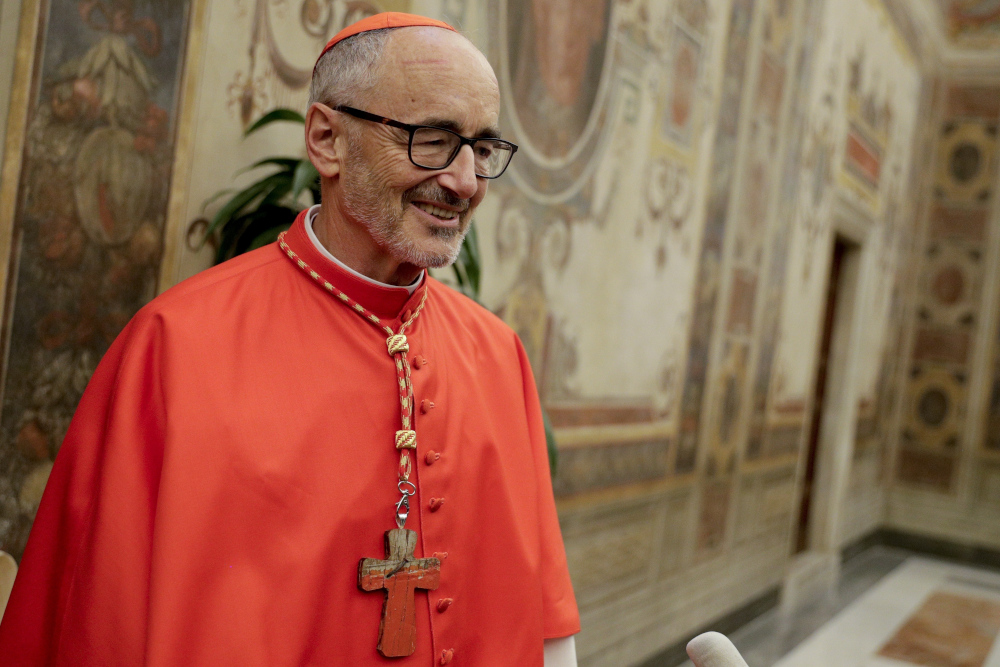 Cardinal Michael Czerny poses for photographers prior to meeting relatives and friends after he was elevated to cardinal by Pope Francis, at the Vatican, Oct. 5, 2019. (AP Photo/Andrew Medichini, File)