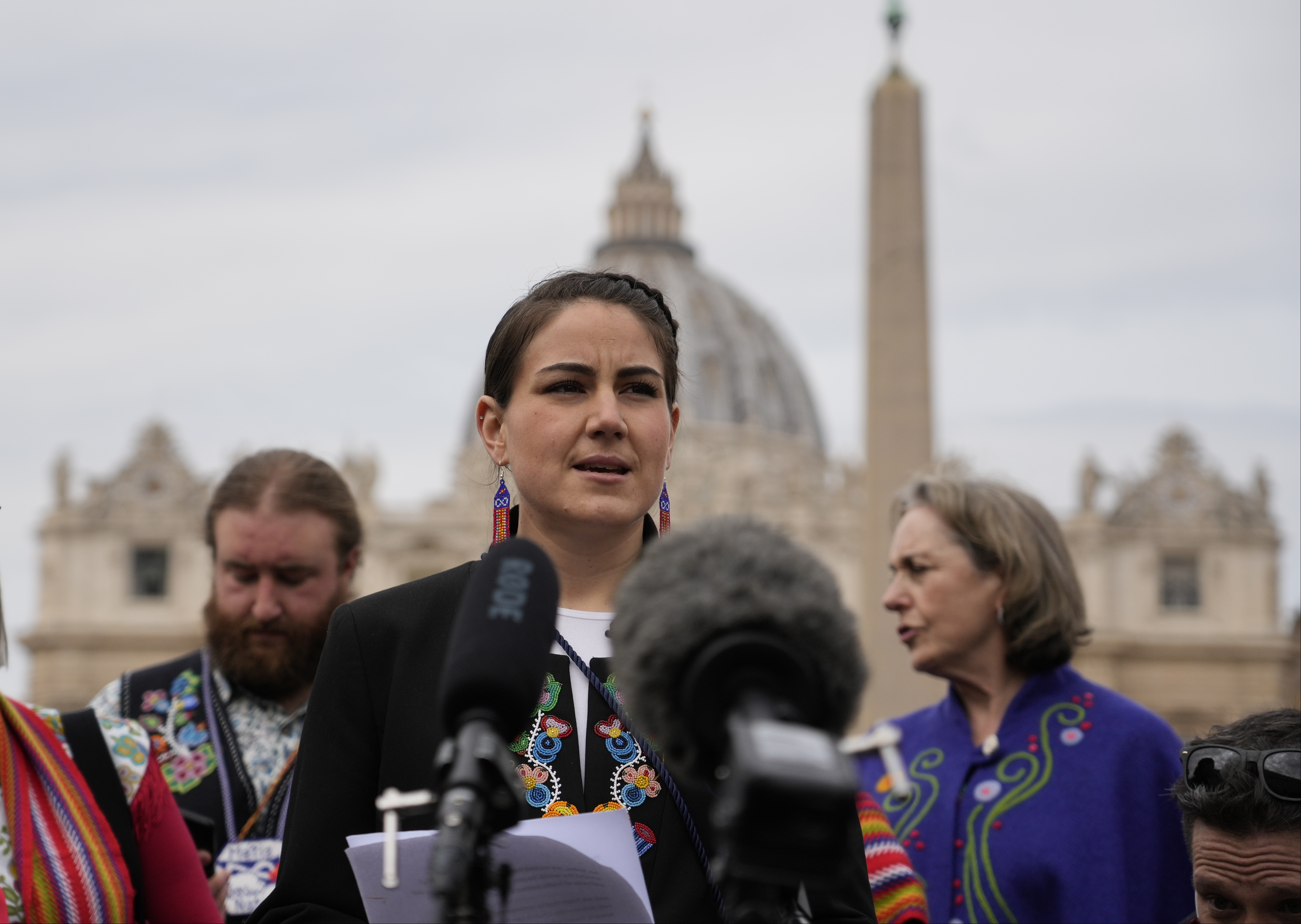 President of the Metis community, Cassidy Caron, speaks to the media in St. Peter's Square after their meeting with Pope Francis at The Vatican, Monday, March 28, 2022. (AP Photo/Gregorio Borgia)