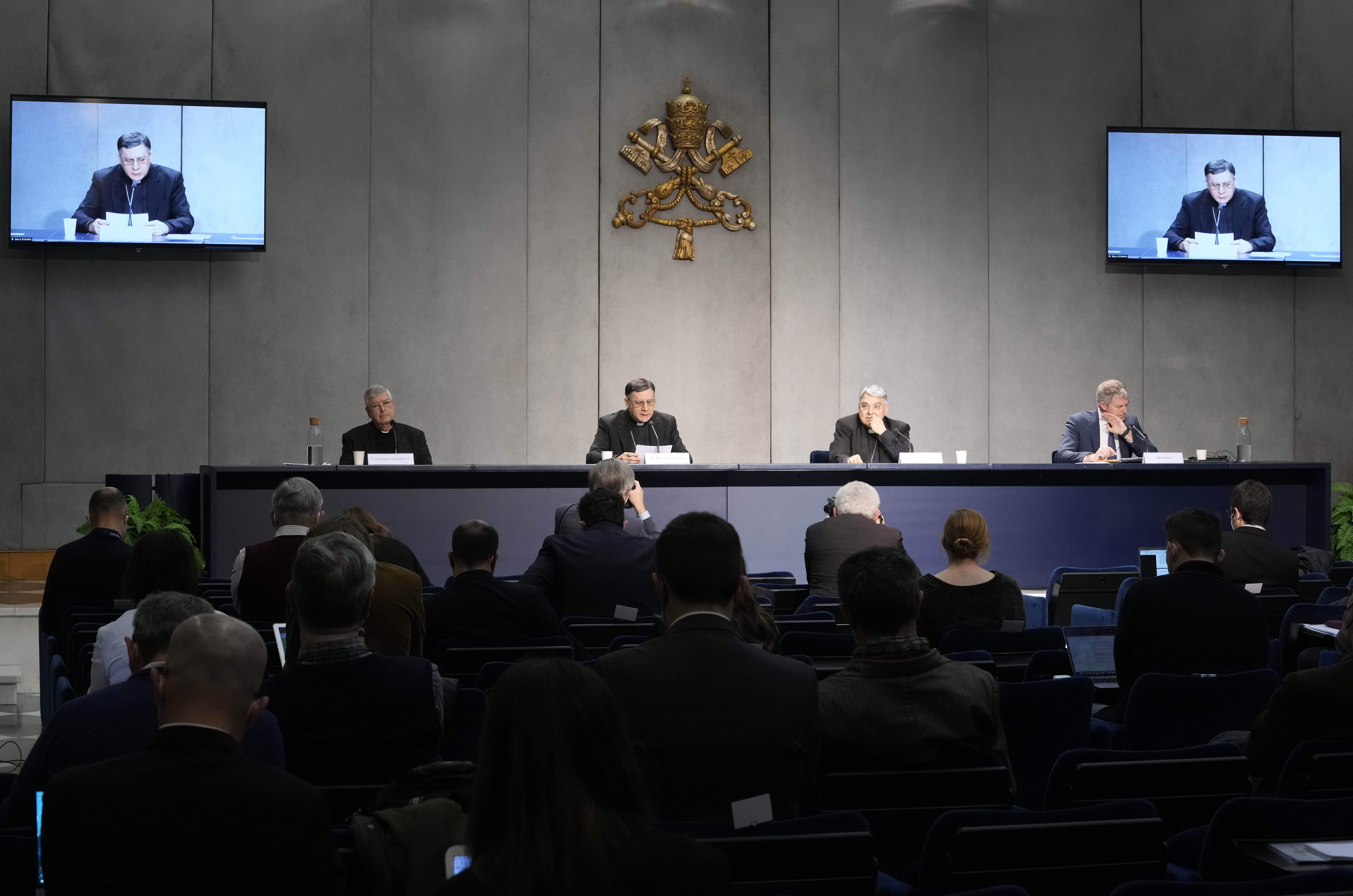 From left, Professor Gianfranco Ghirlanda, Mons. Marco Mellino, Cardinal Marcello Semeraro, and Vatican's spokesman Matteo Bruni, attend the presentation of the long-awaited reform program of the Holy See bureaucracy, during a press conference at the Vati