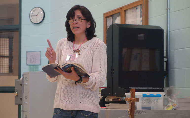 Esmeralda Saltos communicates a message of Christ-centered hope, mercy and love to 86 detainees during the first of three Sunday Catholic services at the Northwest Detention Center in Tacoma, Wash., Sept. 13. (Photos by Maria Laughlin)