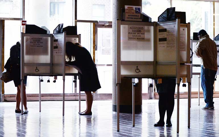 Voters fill out their ballots at a polling station during the mid-term elections Nov. 4 in Washington, D.C. (ABACAUSA.com/Olivier Douliery)