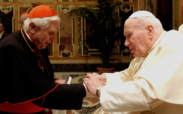 Cardinal Joseph Ratzinger, who later became Pope Benedict XVI, greets Pope John Paul II in 2004 at the Vatican. (CNS/Catholic Press Photo)