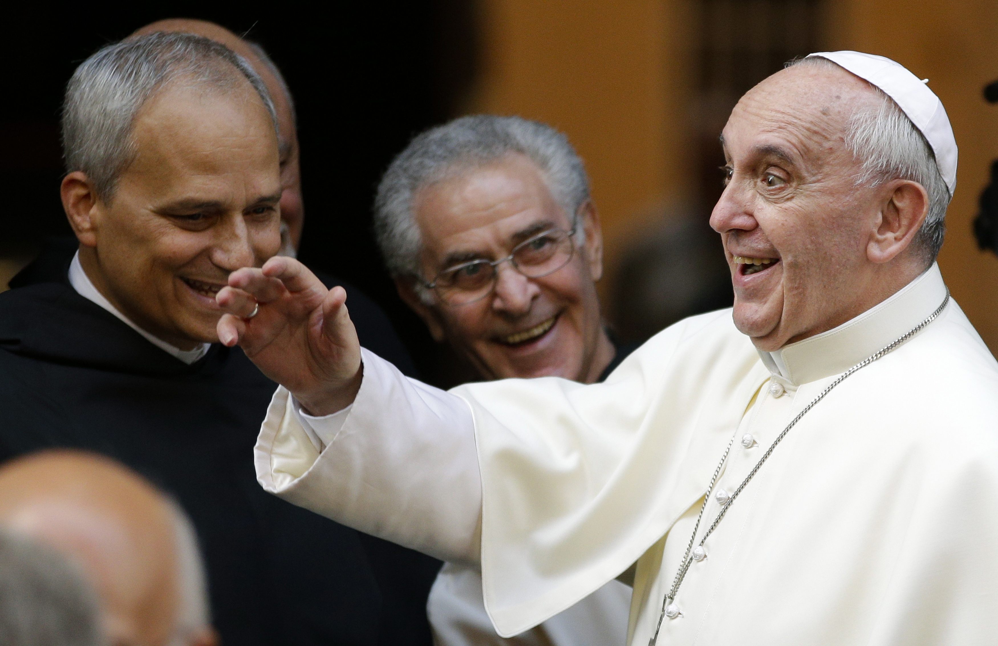 Pope Francis waves to well-wishers as he arrives to celebrate Mass at the Basilica of St. Augustine in Rome on the saint's feast day Aug. 28. (CNS photo/Max Rossi, Reuters)