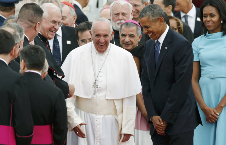 U.S. President Barack Obama and first lady Michelle Obama welcome Pope Francis at Joint Base Andrews as the pope arrives to the United States for the first time Sept. 22. (CNS/Kevin Lamarque, Reuters)