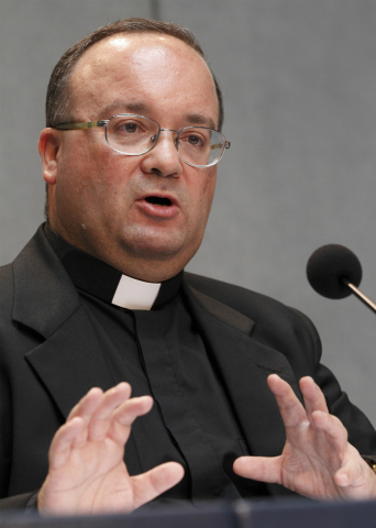 Archbishop Charles Scicluna of Malta is pictured in a 2015 photo at the Vatican. Under certain circumstances and after long prayer and a profound examination of conscience, some divorced and civilly remarried Catholics may return to the sacraments, said the bishops of Malta, responding to Pope Francis' exhortation, "Amoris Laetitia". (CNS photo/Paul Haring)