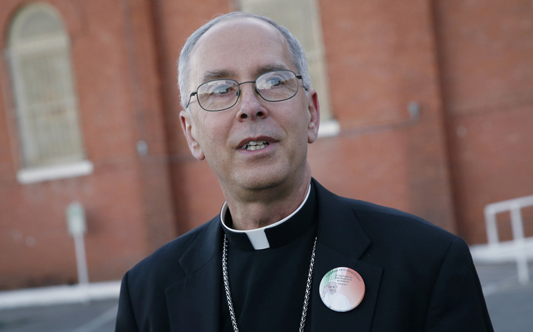 Bishop Mark Seitz is seen Feb 15, 2016, outside St. Ignatius Church in the Segundo Barrio of El Paso. (CNS/Nancy Wiechec)