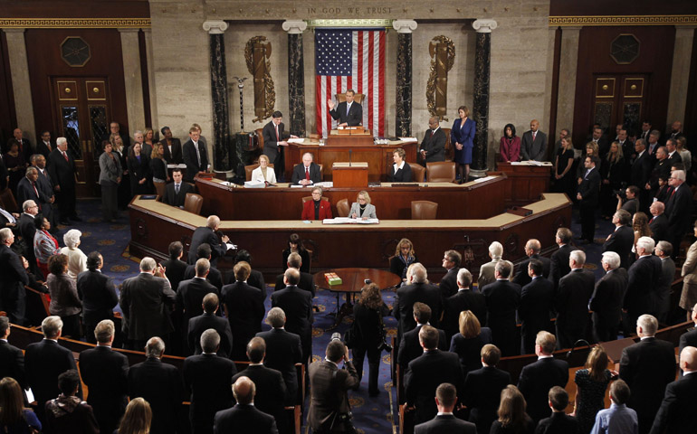 Speaker of the House John Boehner takes his oath Jan. 3 during the first day of the 113th Congress at the U.S. Capitol in Washington. (CNS/Reuters/Kevin Lamarque)