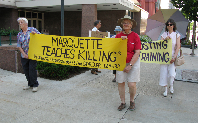 Members of Breaking the Silence walk to the courthouse Monday