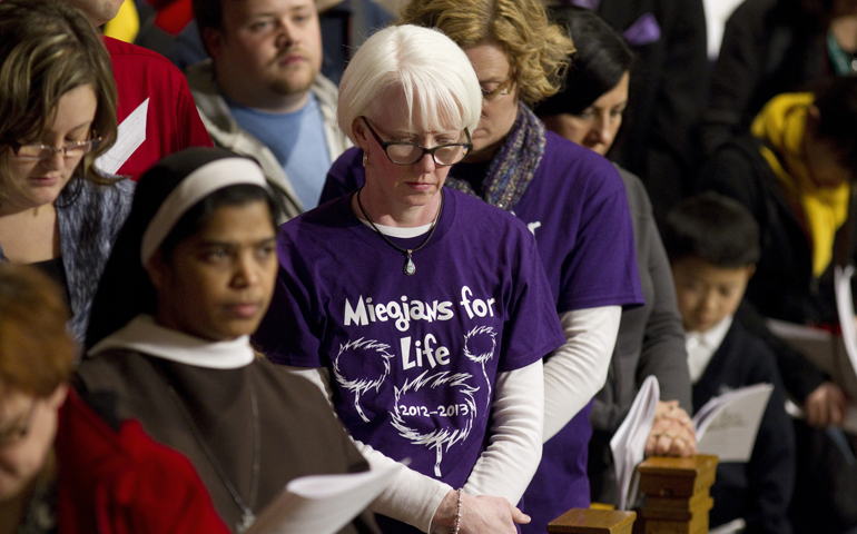 People pray during the opening Mass of the National Prayer Vigil for Life on Thursday at the Basilica of the National Shrine of the Immaculate Conception in Washington. (CNS/Nancy Phelan Wiechec)