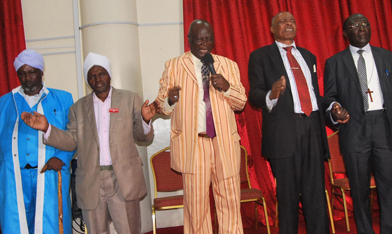 Senior leaders of evangelical churches in Kenya pray at a meeting called to protest laws regulating the country’s churches in January 2016. (Religion News Service/Fredrick Nzwili)