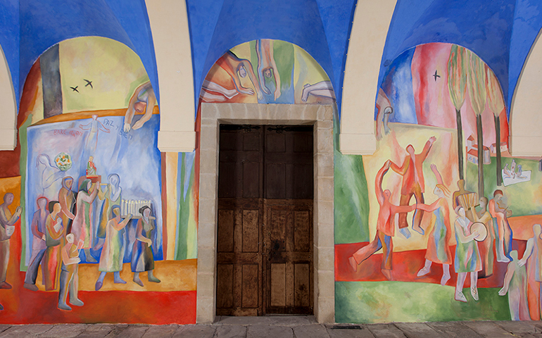 The motifs in the Portico chronicle Antezana’s successful protest against airport expansion that would have demolished the church. (Photo courtesy of Jose Luis Alonso Quilchano)