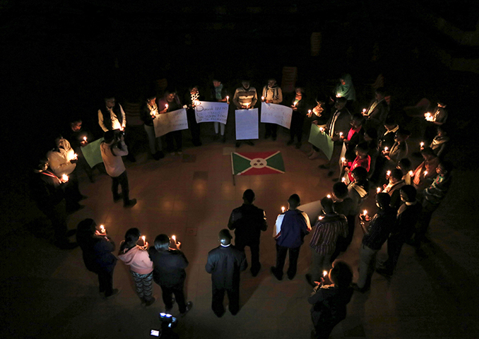 Students from the Catholic University light candles during a night vigil in solidarity with the Burundian people in Kenya's capital Nairobi, on Dec. 16, 2015. (Reuters/Noor Khamis)