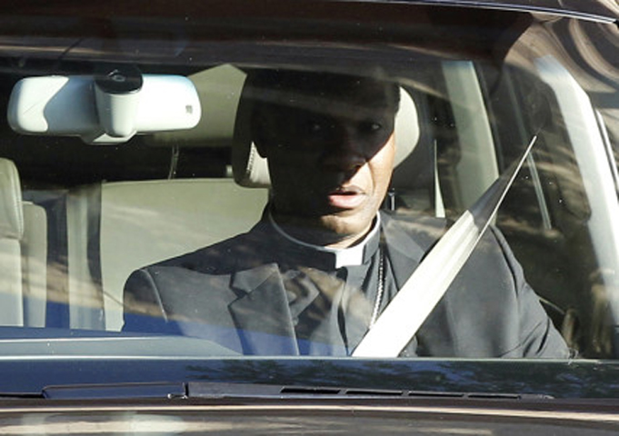 Anglican Archbishop of Cape Town Thabo Makgoba leaves a Pretoria hospital where Nelson Mandela was being treated on June 25, 2013. (Reuters/Siphiwe Sibeko)