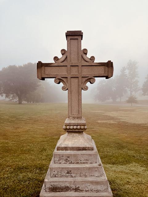 A cross in a field (Helga Leija)