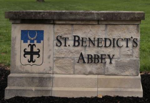 A sign reading "St. Benedict's Abbey"