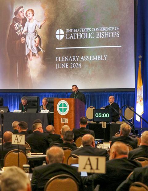 Bishop Daniel Flores of Brownsville, Texas, speaks June 13 at the U.S. Conference of Catholic Bishops' Spring Plenary Assembly in Louisville, Kentucky. (OSV News photo/Bob Roller)
