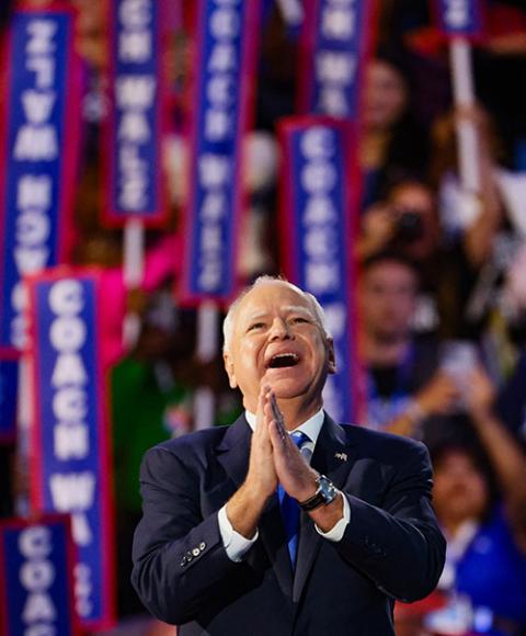 Minnesota Gov. Tim Walz takes the stage during the Democratic National Convention at the United Center in Chicago Aug. 21. (OSV News/Reuters/Brendan Mcdermid)