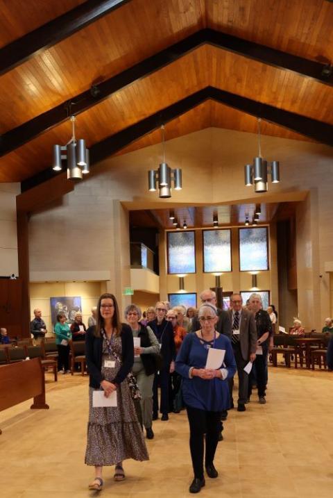 Worshippers process into the chapel at the Mount St. Benedict Monastery in Erie, Pennsylvania. 