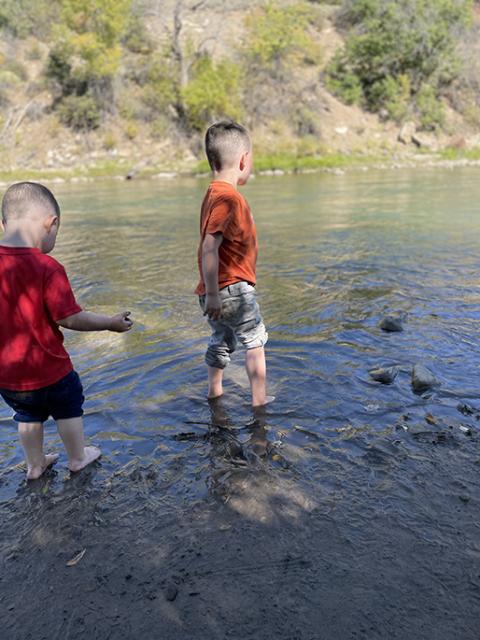 Brittany, her husband and their two sons, pictured playing along the Animas River in Colorado, rely on Medicaid for a range of services, including medical and dental care and speech therapy for the 4-year-old. (Courtesy photo)