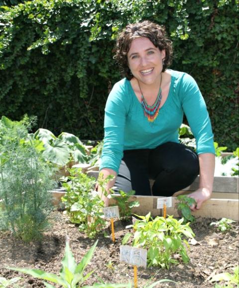 Bethany Welch, founding director of the Aquinas Center in South Philadelphia, in the center's garden (CNS/CatholicPhilly.com/Sarah Webb)