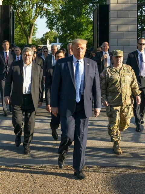 President Donald Trump walks from the White House June 1 for a photo-op at St. John’s Episcopal Church. Attorney General William Barr is at left. (Wikimedia Commons/The White House/Shealah Craighead)