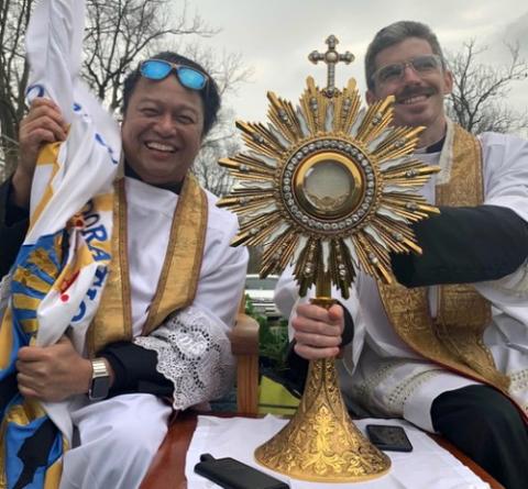 Fr. Santos "Sunny" Castillo, left, and parochial vicar Fr. John Horan of St. John Paul II Catholic Parish in Kankakee, Illinois, drive around parishioners' neighborhoods on Easter morning April 12. (Courtesy of Fr. Santos Castillo)