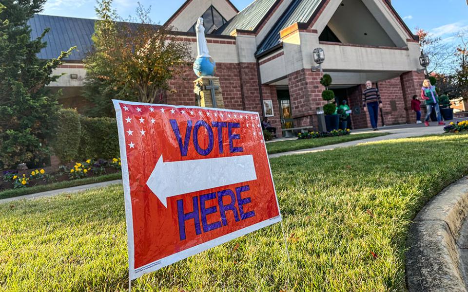 A voting sign is posted in front of St. Mark the Evangelist Catholic Church, a polling location in Hyattsville, Md., on Election Day in 2024. (NCR photo/James Grimaldi)