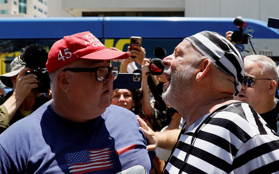 A supporter of then-former U.S. President Donald Trump and an anti-Trump demonstrator argue near the Wilkie D. Ferguson Jr. U.S. Courthouse, on the day Trump appeared for his arraignment on classified document charges, in Miami, Florida, on June 13, 2023. (OSV News/Reuters/Marco Bello)