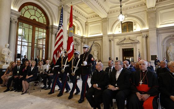 A Marine Corps color guard carries the U.S. and Marine flags during the inauguration of the new headquarters of the U.S. Embassy to the Holy See in Rome Sept. 9, 2015. (CNS/Paul Haring)