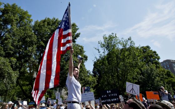 Demonstrators in Washington protest the Trump administration's immigration policy during a national day of action called "Keep Families Together" June 30. (CNS/Tyler Orsburn)