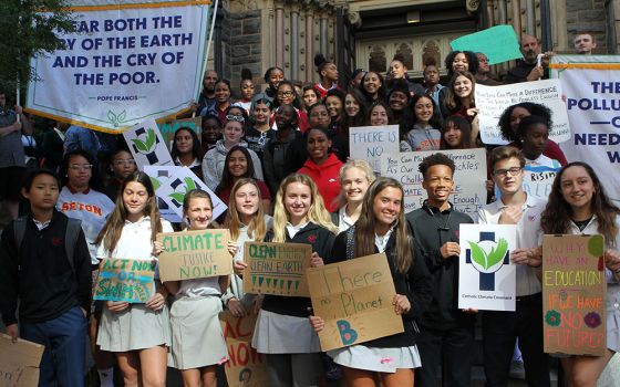 Students from Catholic schools in the Washington Archdiocese stand outside St. Patrick's Church in Washington Sept. 20, 2019, where about 200 of them had gathered to pray prior to the climate change rally in front of the Capitol. (CNS/Carol Zimmerman)