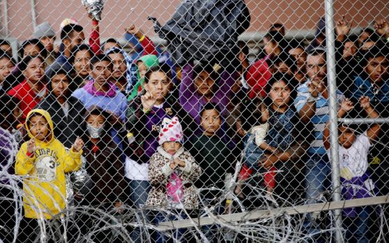 Central American migrants are seen inside an enclosure in El Paso, Texas, March 27, 2019. (CNS/Reuters/Jose Luis Gonzalez)