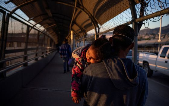 Near El Paso, Texas, a Honduran immigrant affected by the U.S. Migrant Protection Protocols, better known as the "Remain in Mexico" program, walks back to Ciudad Juárez, Mexico, April 20, 2020.