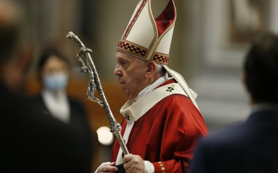 Pope Francis arrives to celebrate Mass marking the feast of Sts. Peter and Paul in St. Peter's Basilica at the Vatican June 29. (CNS/Paul Haring)