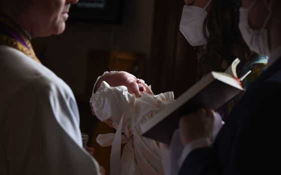 Beatrice Anne Borman is seen during her baptism April 18, 2020, at St. James Church in Falls Church, Virginia. (CNS/Zoey Maraist, Arlington Catholic Herald)