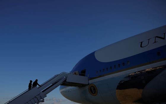 Then-President Donald Trump and first lady Melania Trump depart Joint Base Andrews in Maryland Jan. 20, ahead of then-President-elect Joe Biden's inauguration. (CNS/Carlos Barria, Reuters)