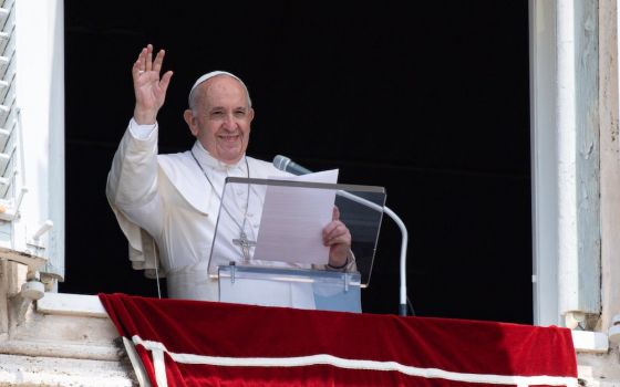 Pope Francis greets the crowd gathered in St. Peter's Square at the Vatican for the midday recitation of the Angelus July 4. After speaking about the day's Gospel reading and leading the prayer, Pope Francis went to Rome's Gemelli hospital for colon surge