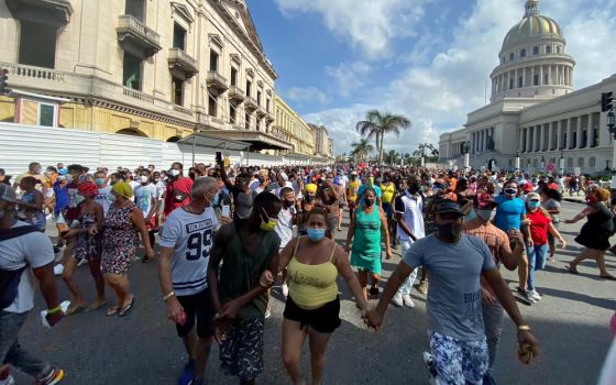 People participate in demonstrations in Havana July 11. 