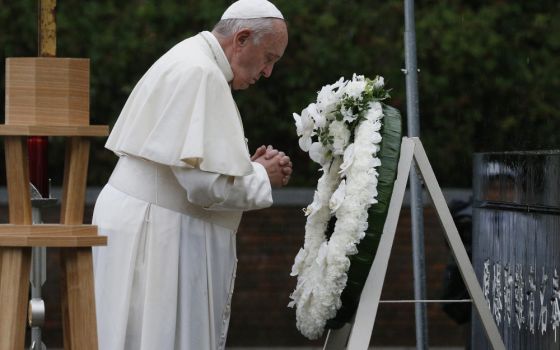 Pope Francis prays as he visits the Atomic Bomb Hypocenter Park in Nagasaki, Japan, Nov. 24, 2019. (CNS/Paul Haring)