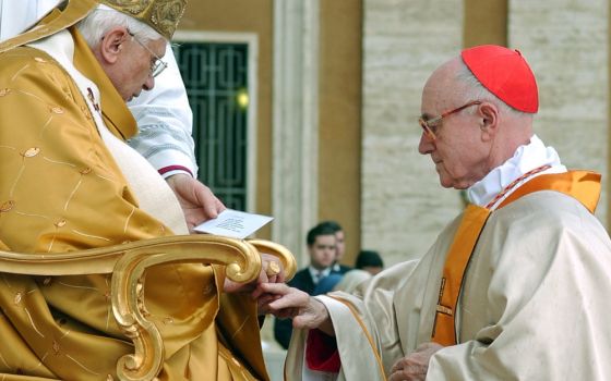 French Cardinal Albert Vanhoye of France receives his ring from then-Pope Benedict XVI during a consistory in St. Peter's Square at the Vatican March 25, 2006. (CNS/L'Osservatore Romano)