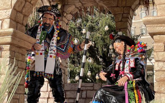 Statues of Joseph and Mary are pictured in the Nativity scene in St. Peter's Square during a preview for journalists at the Vatican Dec. 9, 2021. (CNS photo/Junno Arocho Esteves)