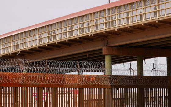 Venezuelan migrants expelled from the U.S. under Title 42 walk across the Lerdo-Stanton International border bridge to Ciudad Juarez, Mexico, Oct. 14, 2022.